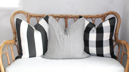 Black and white check and striped cushion covers