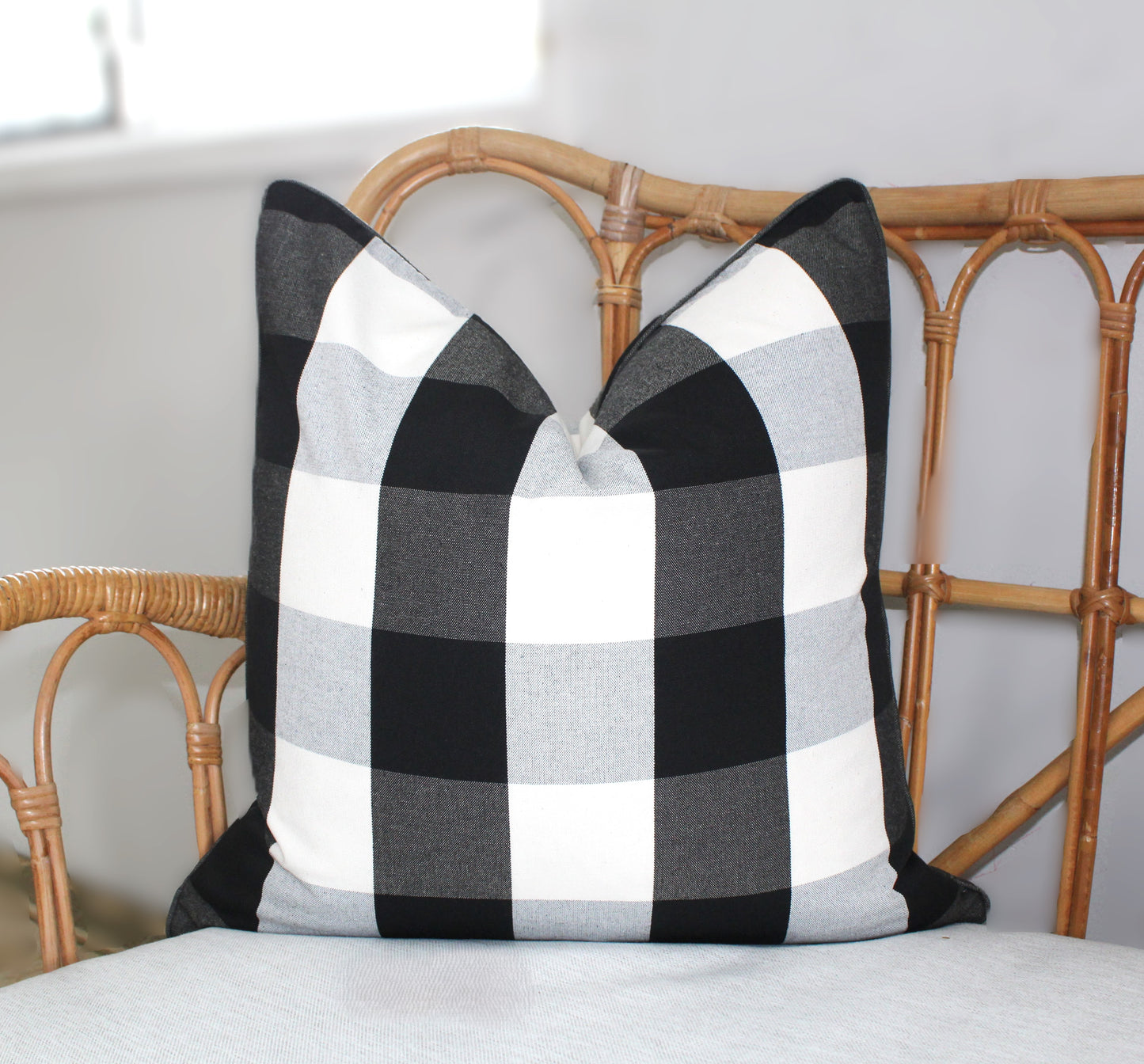 Black and white check and striped cushion covers