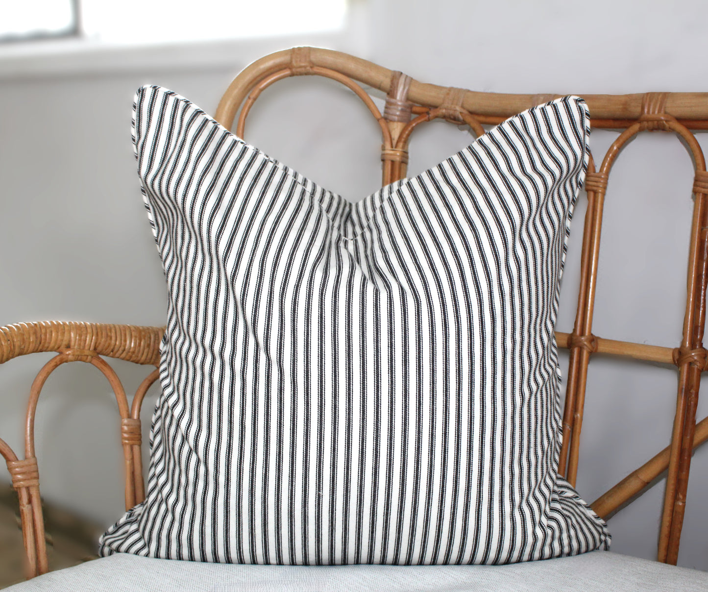 Black and white check and striped cushion covers