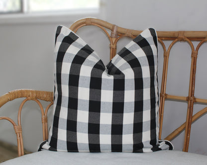 Black and white check and striped cushion covers