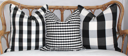 Black and white check and striped cushion covers