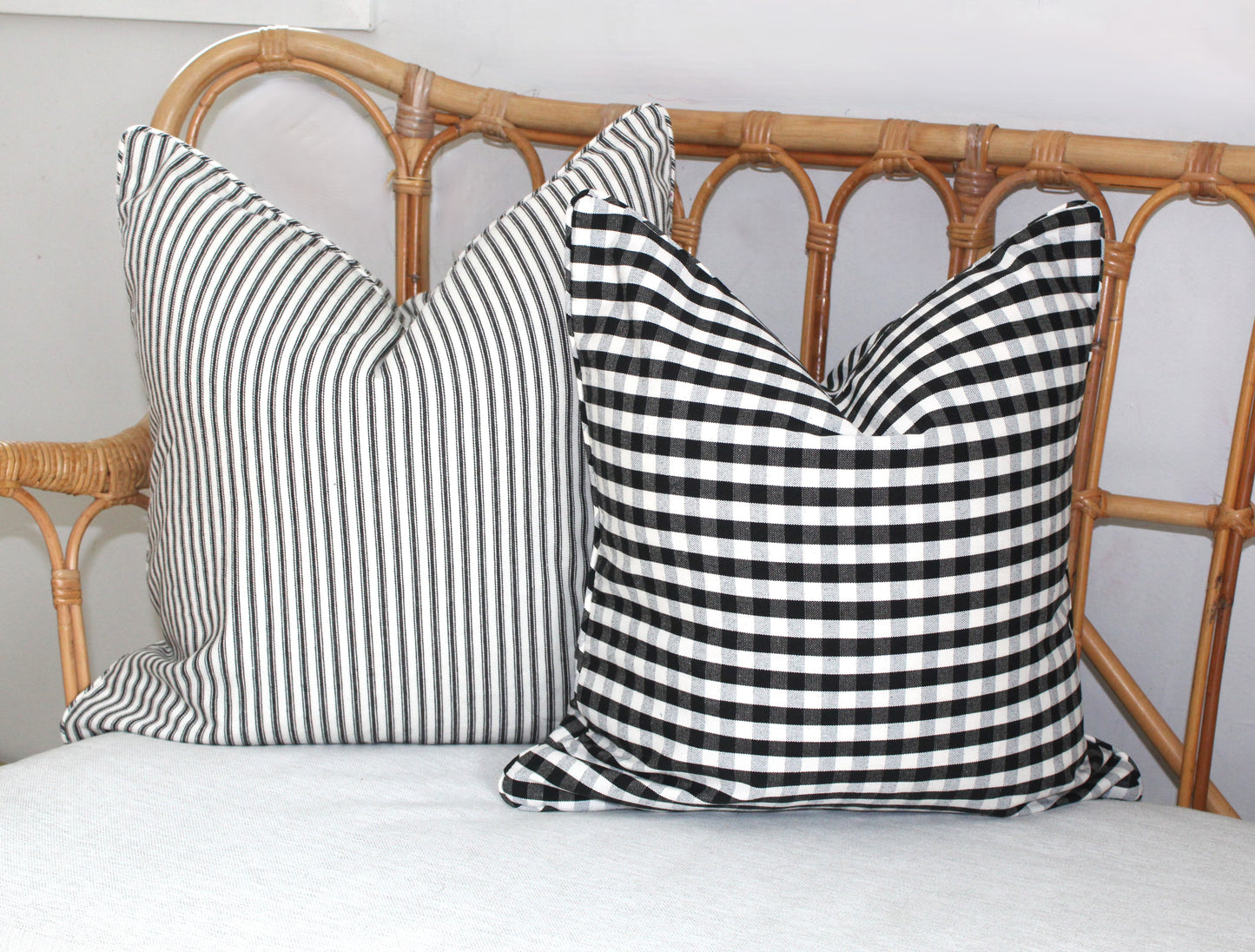 Black and white check and striped cushion covers