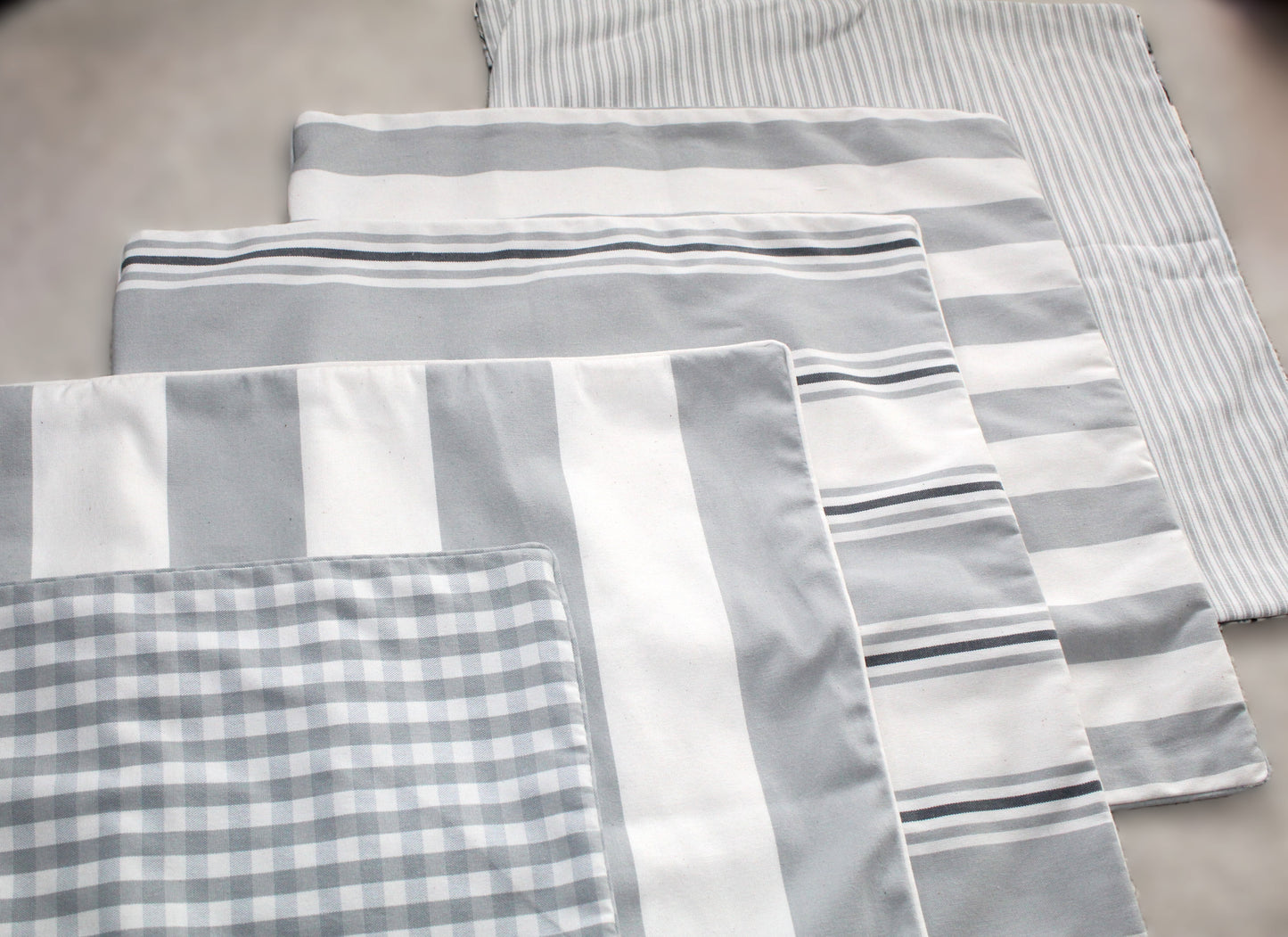 Black and white check and striped cushion covers